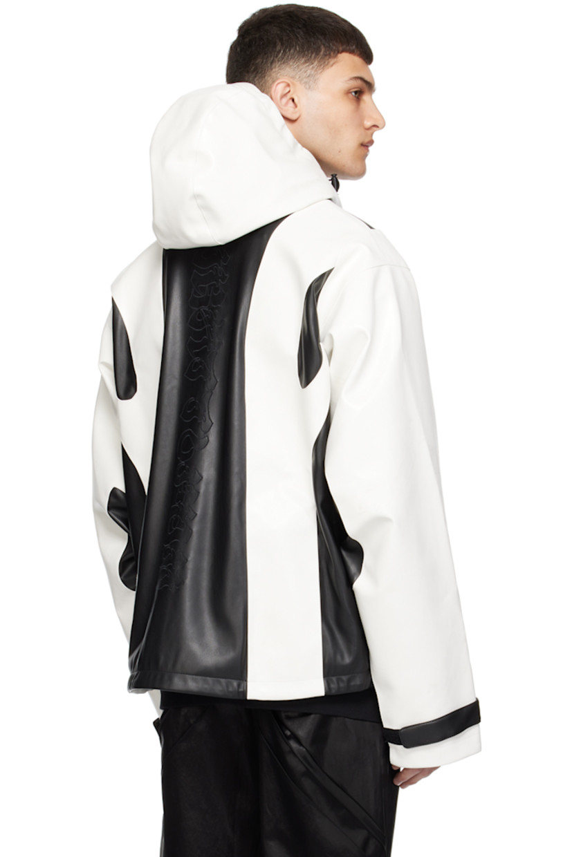 Grained faux-leather jacket. Smudging throughout.

· Paneled construction
· Bungee-style drawstring at hood and hem
· Stand collar
· Two-way zip closure
· Zip pockets
· Velcro tab at cuffs
· Graphic embroidered at back
· Zip pocket at interior
· Full satin lining

Supplier color: Black/Cannoli cream