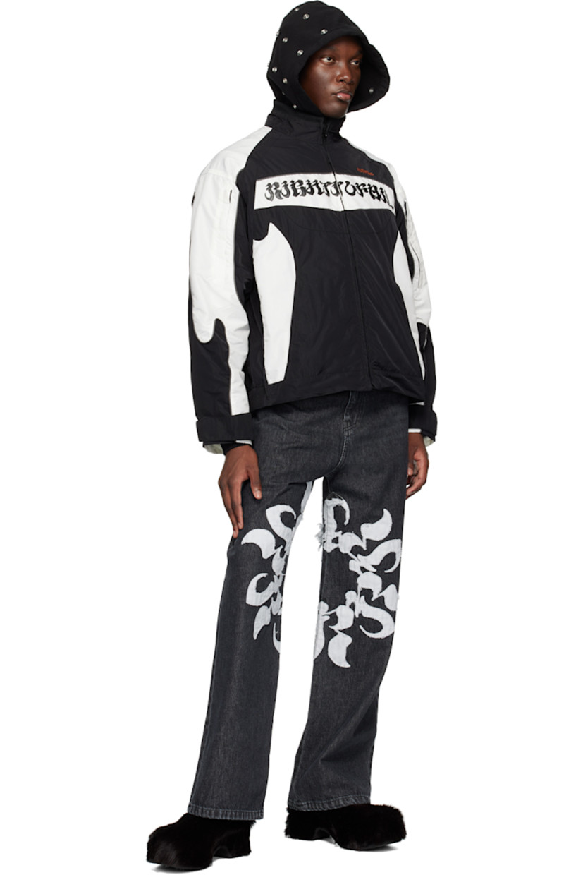 Non-stretch denim jeans. Fading throughout.

· Belt loops
· Five-pocket styling
· Zip-fly
· Distressed graphic patches at legs
· Leather logo patch at back waistband

Supplier color: Black
