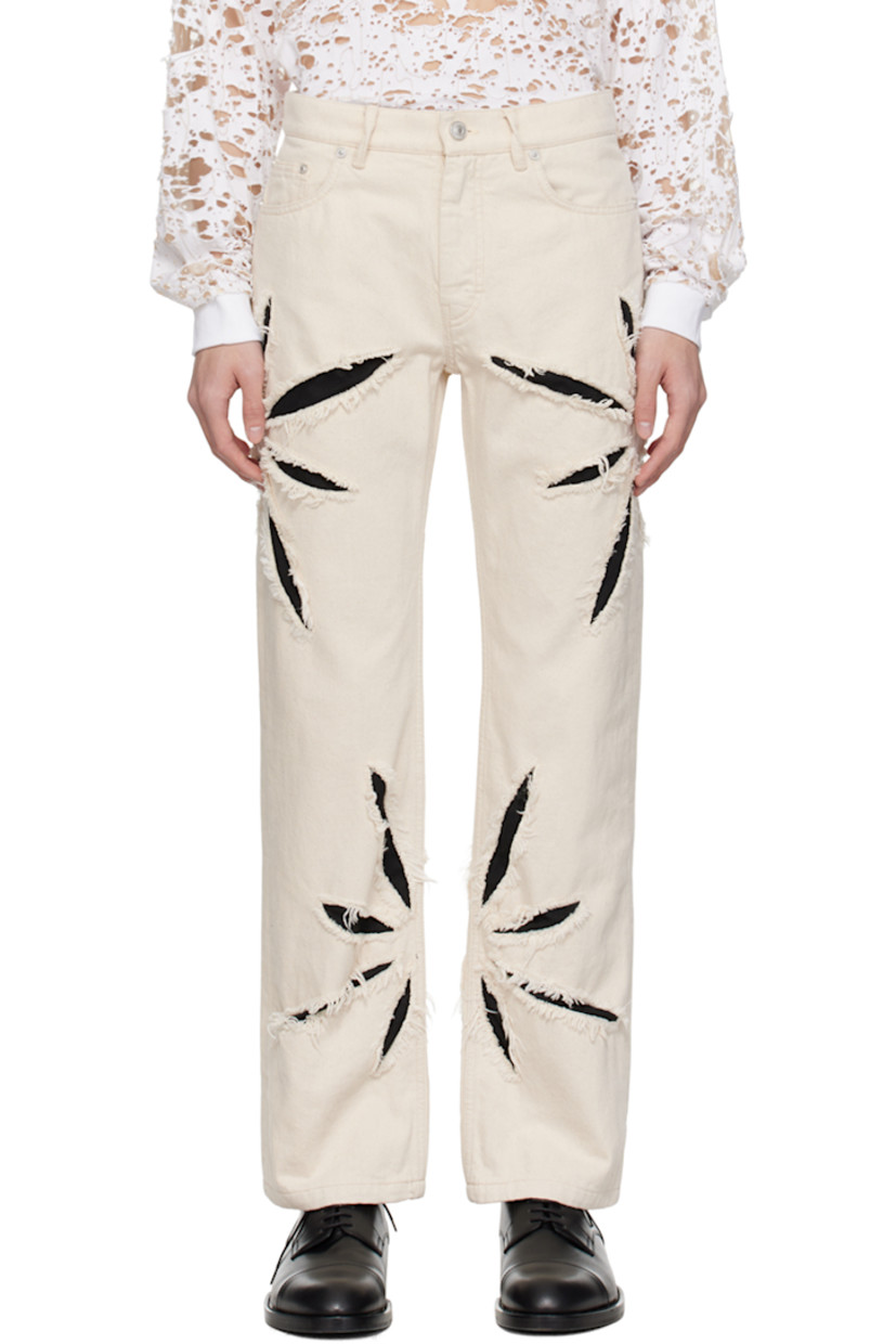 Straight-leg non-stretch denim jeans. 

· Belt loops
· Five-pocket styling
· Zip-fly
· Graphic cutouts and underlay at outseams
· Frayed edges at cutouts
· Logo patch at back waistband
· Full cotton herringbone lining
· Logo-engraved silver-tone hardware 

Supplier color: Cannoli cream/Black