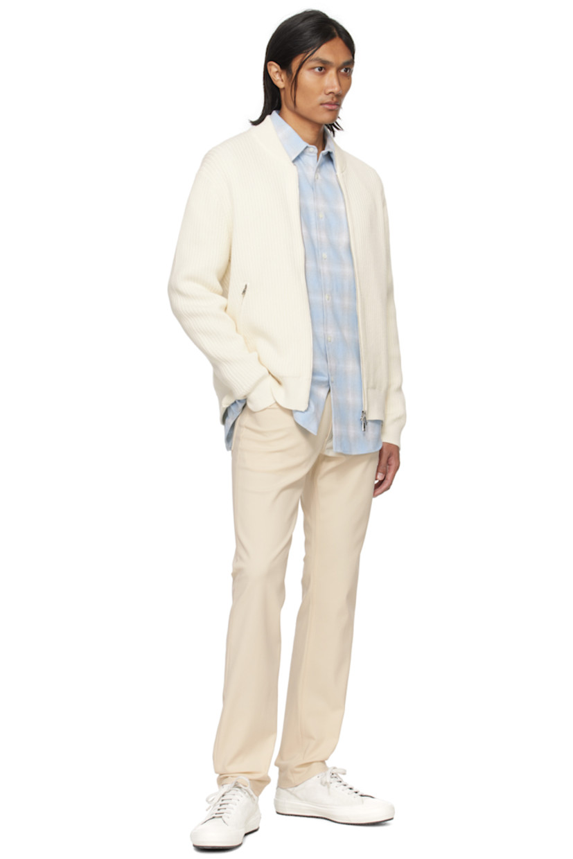 Recycled cotton-blend flannel shirt. Check pattern throughout. 

· Spread collar
· Button closure
· Shirttail hem 
· Single-button barrel cuffs

Supplier color: Blue multi