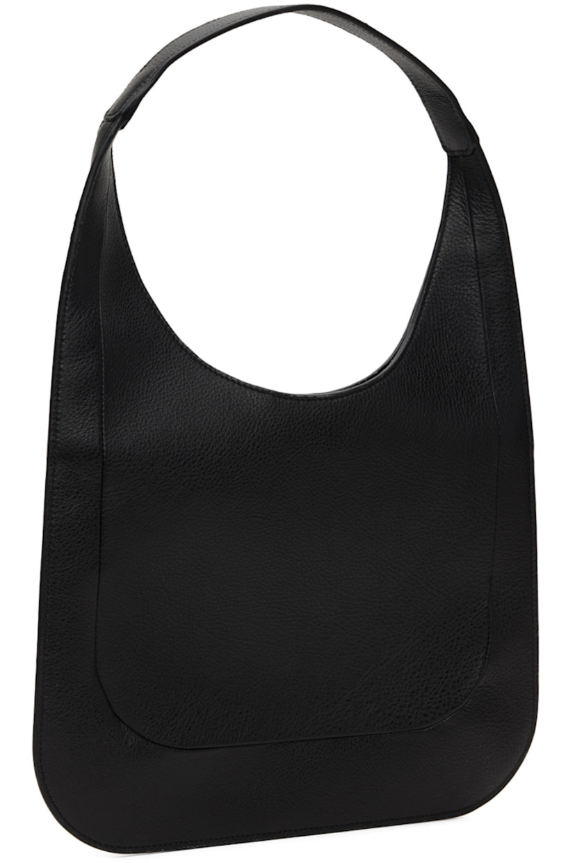 Grained calfskin shoulder bag in black.

· Integrated shoulder strap
· Logo embossed at face
· Magnetic closure
· Patch pocket at interior
· Faille lining
· H9.25" x W12"
· Total height: H17"

Supplier color: Grain black