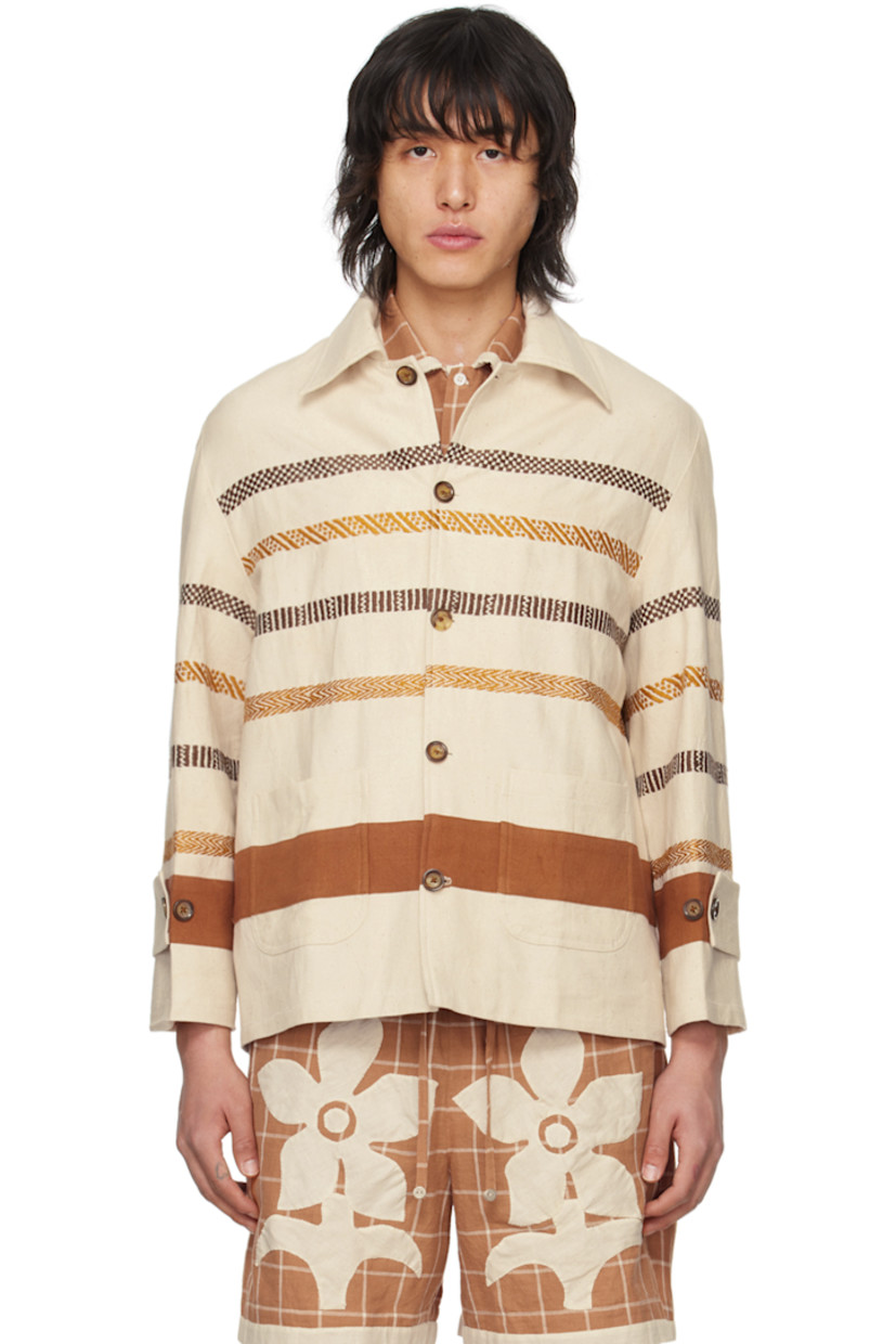 Handcrafted cotton canvas jacket. Stripes embroidered throughout.

· Spread collar
· Button closure
· Patch pockets
· Adjustable button tab at cuffs
· Full cotton poplin lining

Supplier color: Off white