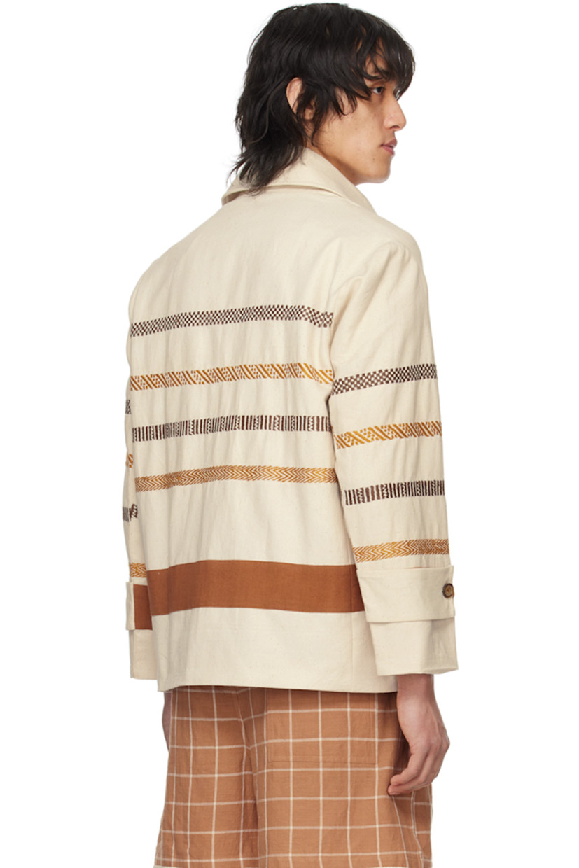 Handcrafted cotton canvas jacket. Stripes embroidered throughout.

· Spread collar
· Button closure
· Patch pockets
· Adjustable button tab at cuffs
· Full cotton poplin lining

Supplier color: Off white