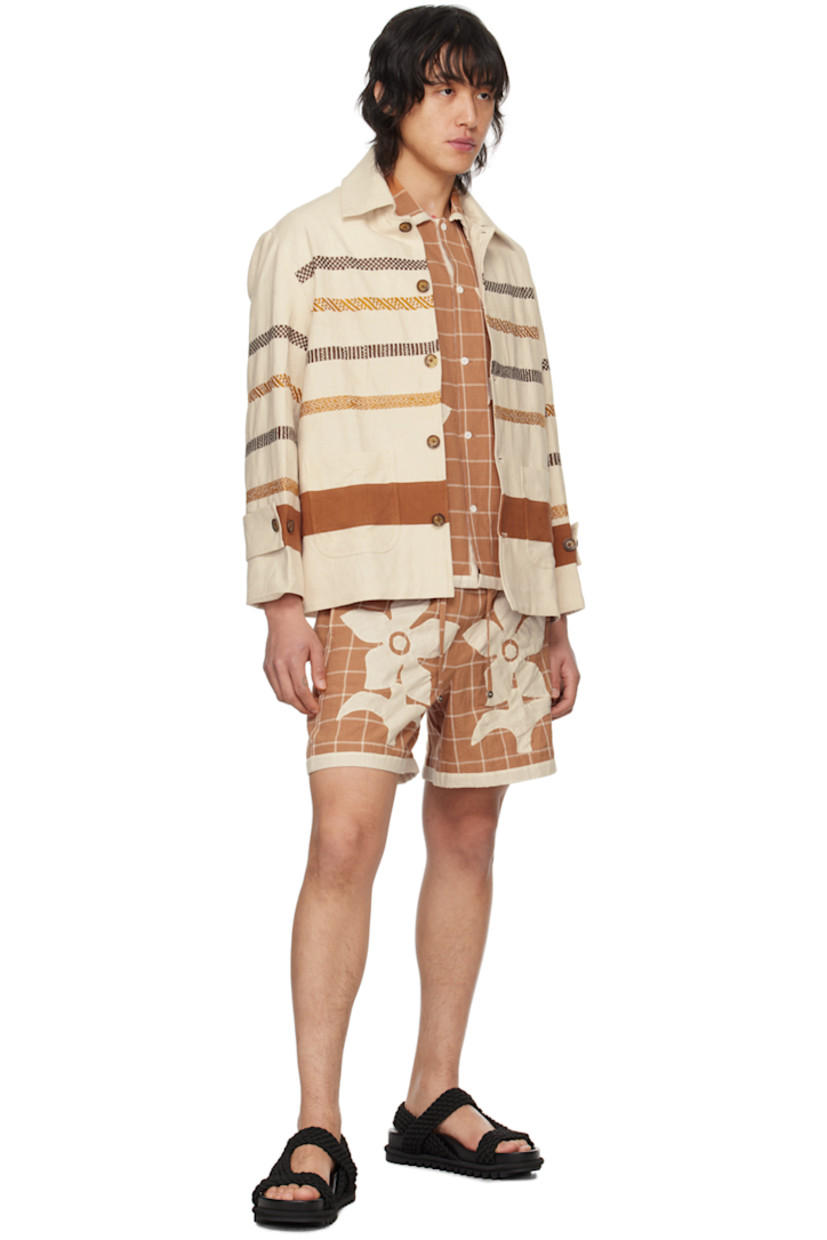 Handcrafted cotton canvas jacket. Stripes embroidered throughout.

· Spread collar
· Button closure
· Patch pockets
· Adjustable button tab at cuffs
· Full cotton poplin lining

Supplier color: Off white