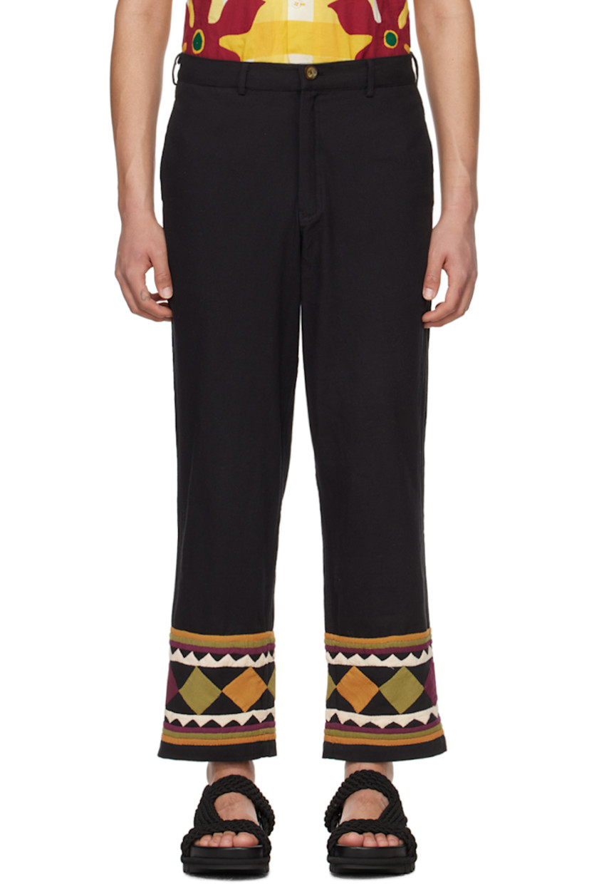 Handcrafted plain-woven cotton trousers.

· Belt loops
· Four-pocket styling
· Zip-fly
· Graphic appliqués and stripes at cuffs

Supplier color: Black