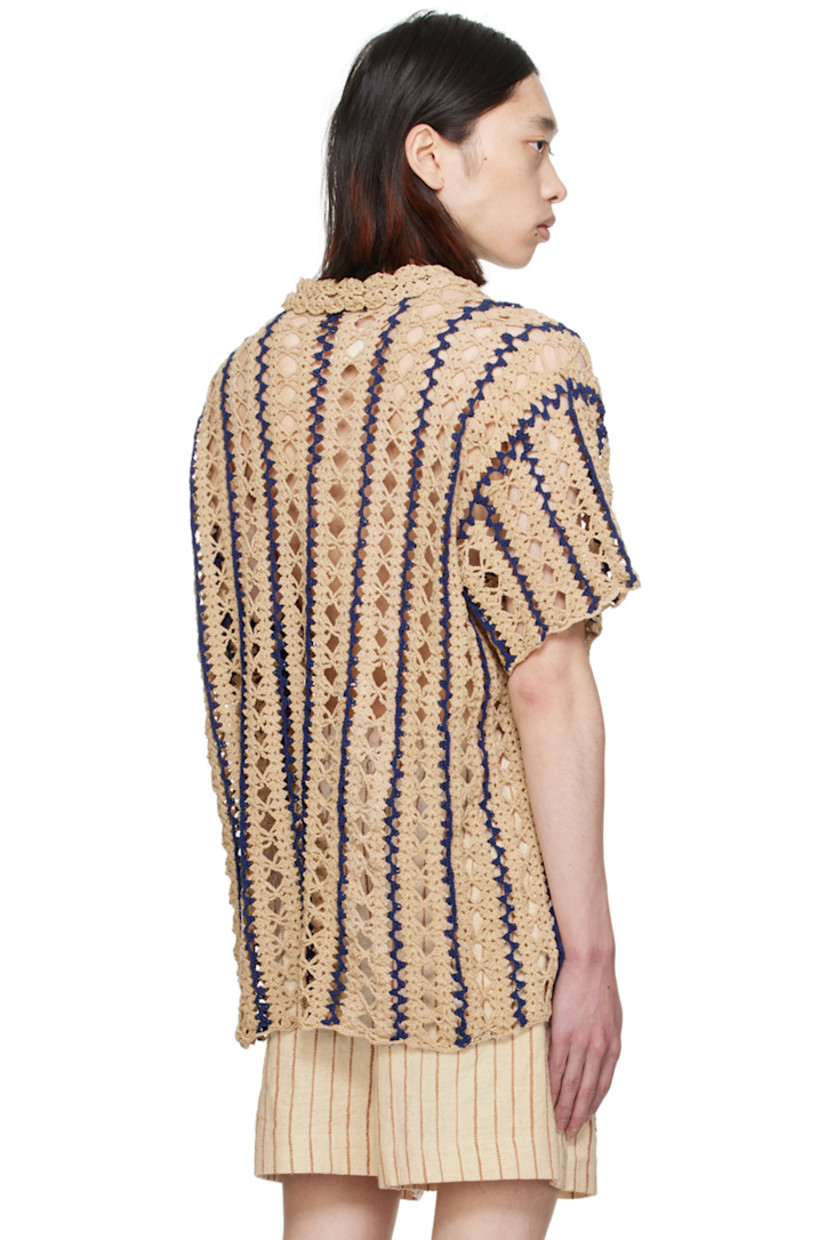 Hand-crocheted cotton shirt. Intarsia stripes and open-crocheted graphic pattern throughout.

· Spread collar
· Button closure

Supplier color: Tan
