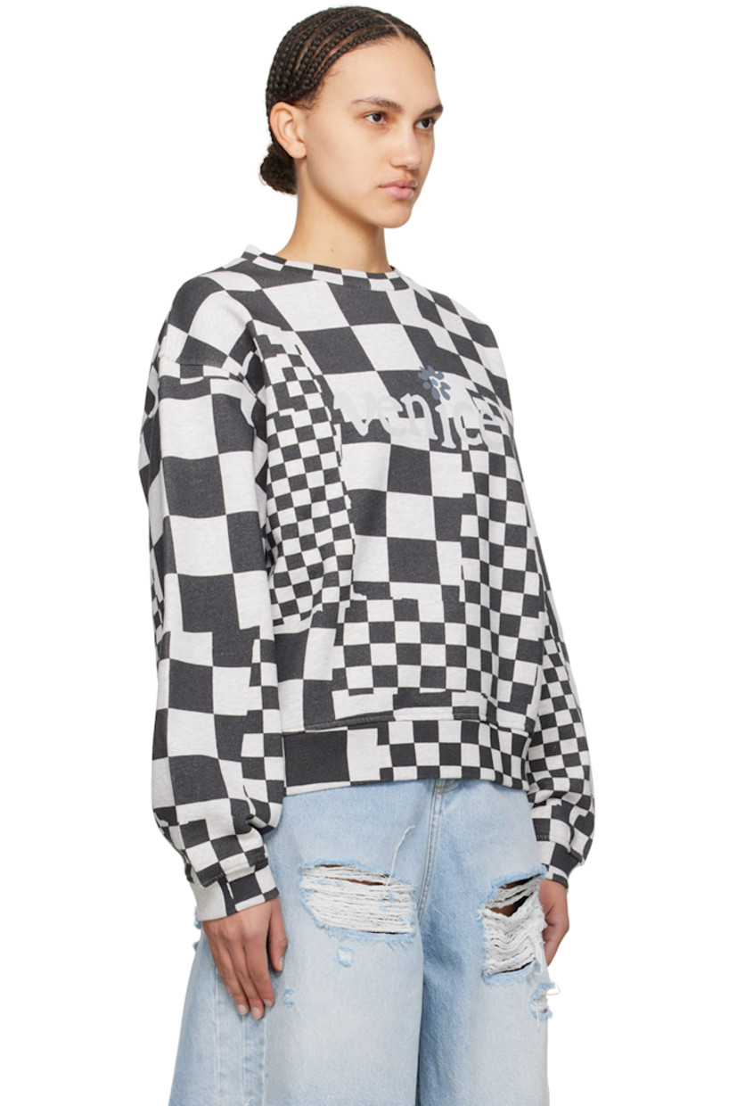 Cotton fleece sweatshirt. Check pattern printed throughout.

· Rib knit crewneck, hem, and cuffs
· Text printed at front

Supplier color: Checker