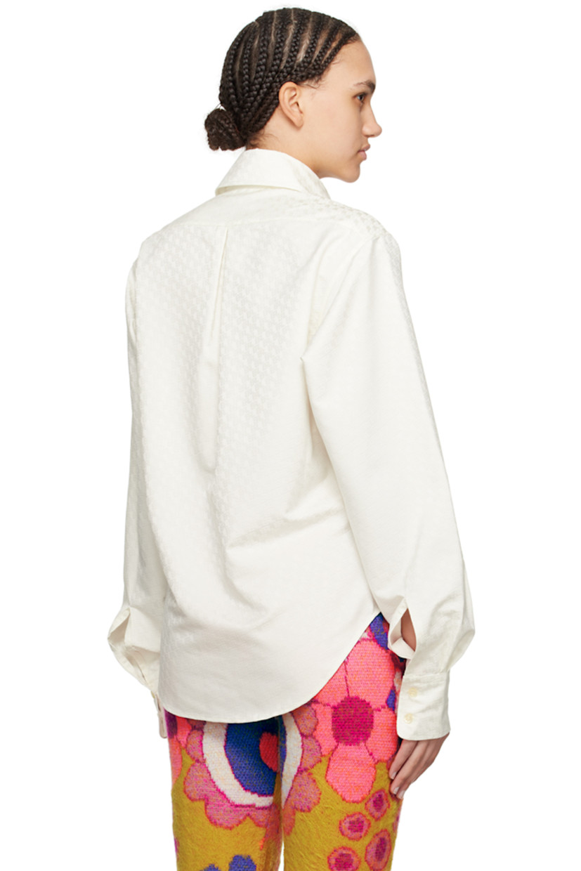 Polyester twill shirt. Jacquard logo pattern throughout.

· Spread collar
· Button closure
· Patch pocket at chest
· Two-button barrel cuffs
· Inverted box pleat at back yoke

Supplier color: Natural white