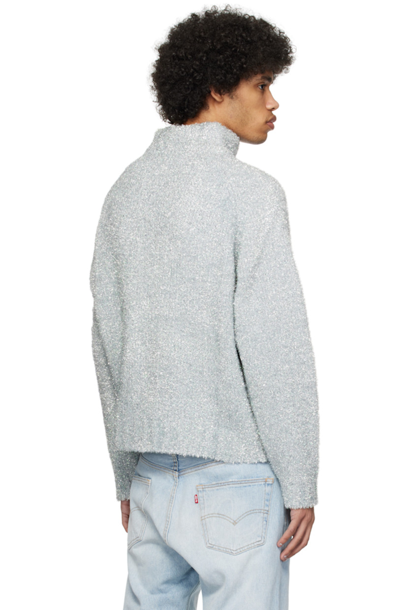 Knit polyester- and nylon-blend polo. Metallic thread detailing throughout.

· Rib knit spread collar, hem, and cuffs
· Raglan sleeves

Supplier color: Silver