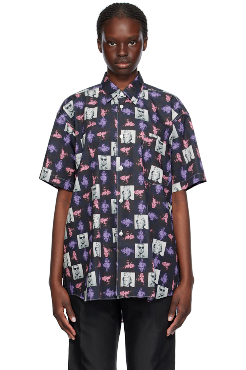 Cotton poplin shirt. Graphic pattern printed throughout.

· Spread collar
· Button closure
· Patch pocket
· Droptail hem
· Box pleat at back yoke
· Contrast stitching in white

Part of the Comme des Garçons Shirt Andy Warhol capsule collection.

Supplier color: Print F