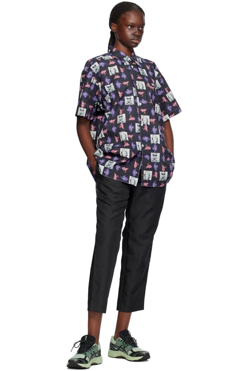 Cotton poplin shirt. Graphic pattern printed throughout.

· Spread collar
· Button closure
· Patch pocket
· Droptail hem
· Box pleat at back yoke
· Contrast stitching in white

Part of the Comme des Garçons Shirt Andy Warhol capsule collection.

Supplier color: Print F