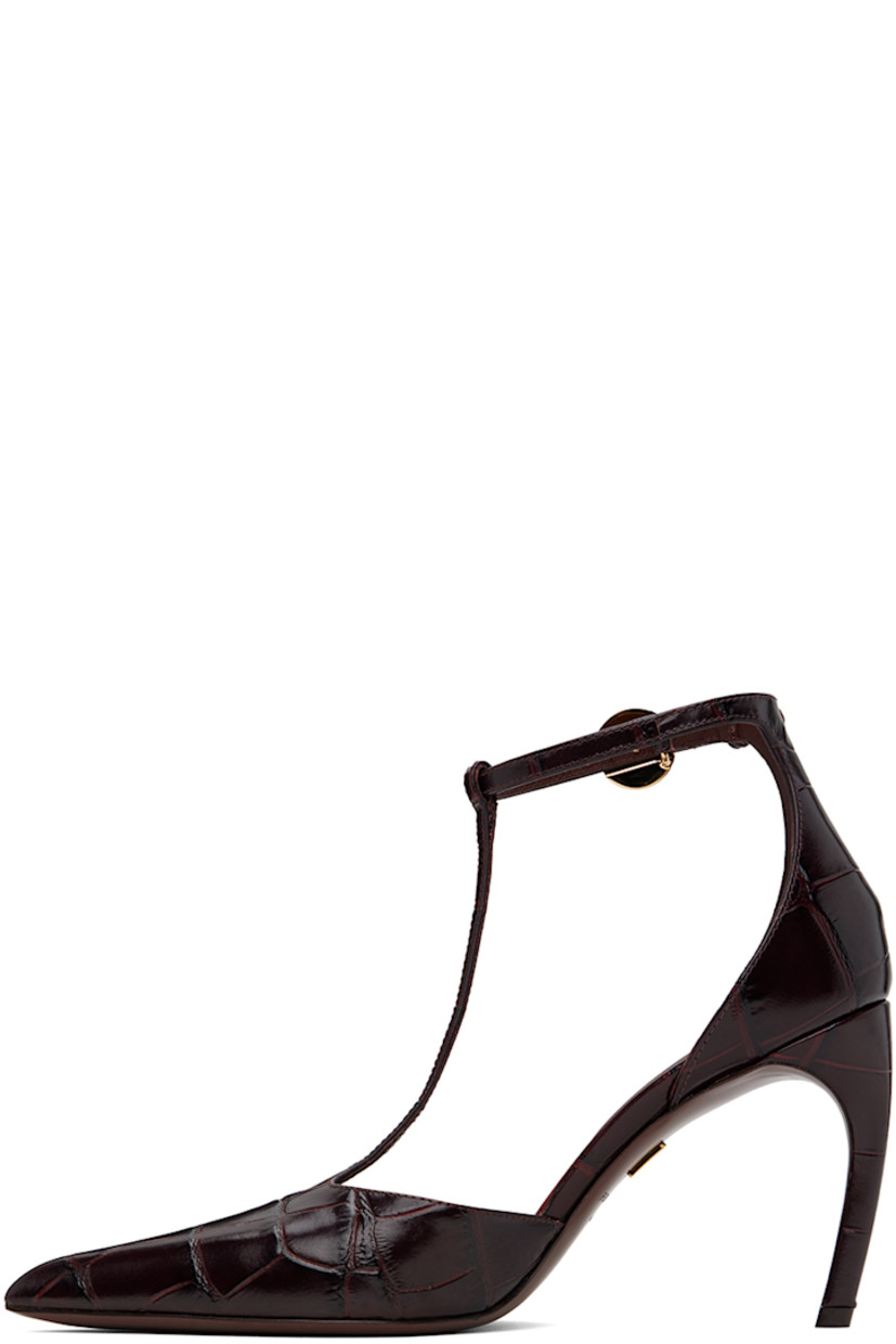 Croc-embossed patent calfskin heels in brown.

· Pointed toe
· Strap at vamp
· Logo hardware at pin-buckle ankle strap
· Grained leather lining
· Covered stiletto heel with rubber injection
· Leather sole 
· Logo-engraved gold-tone hardware
· Heel: H3.25"

Supplier color: Cocoa brown