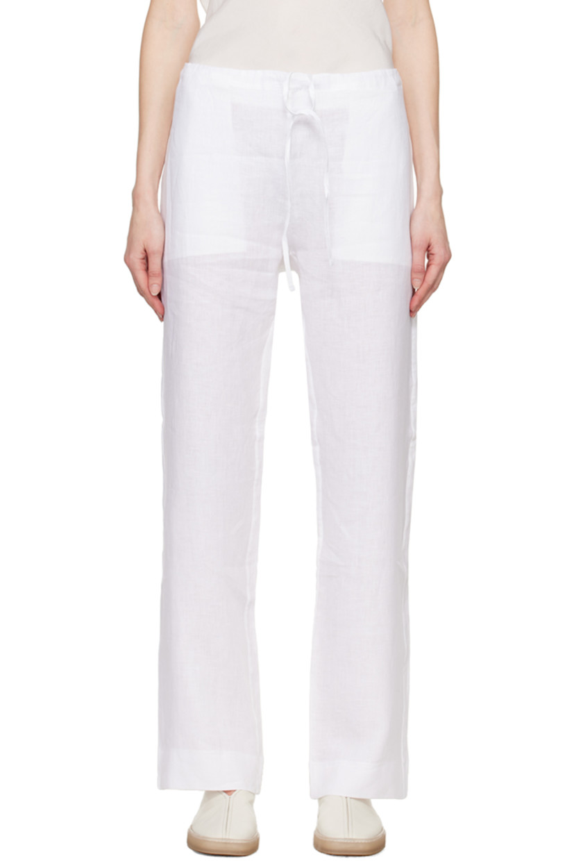 Handmade slub Solbiati® linen canvas trousers.

· Concealed drawstring at waistband
· Four-pocket styling

Part of the Serie No.12 collection.

Supplier color: White
