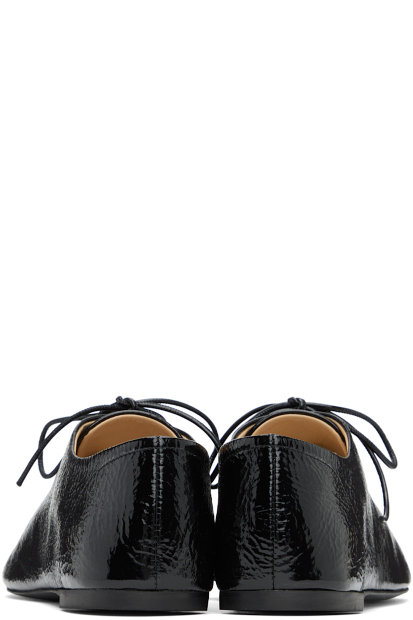 Lightweight patent kidskin oxfords in black.

· Lace-up closure
· Logo printed at buffed leather insole
· Rubber sole

Supplier color: Black