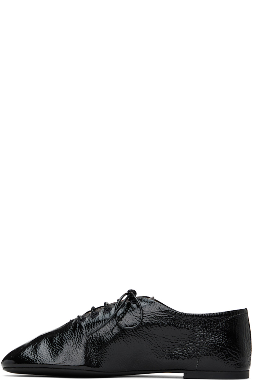 Lightweight patent kidskin oxfords in black.

· Lace-up closure
· Logo printed at buffed leather insole
· Rubber sole

Supplier color: Black