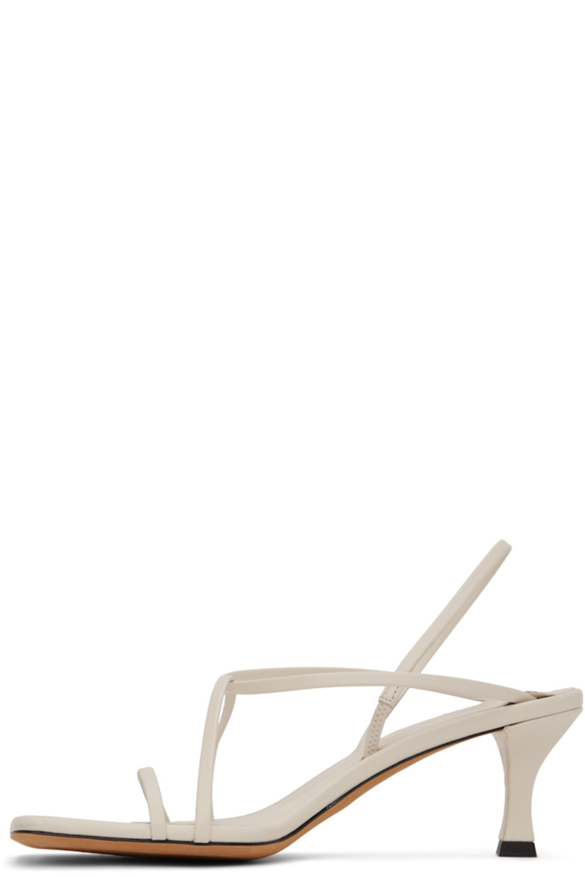 Buffed nappa lambskin heeled sandals in white. 

· Open square toe
· Criss-crossing straps at vamp
· Partially elasticized pin-buckle slingback strap
· Logo embossed at padded leather footbed
· Covered stiletto heel with rubber injection
· Suede sole
· Heel: H2.5"

Supplier color: Natural
