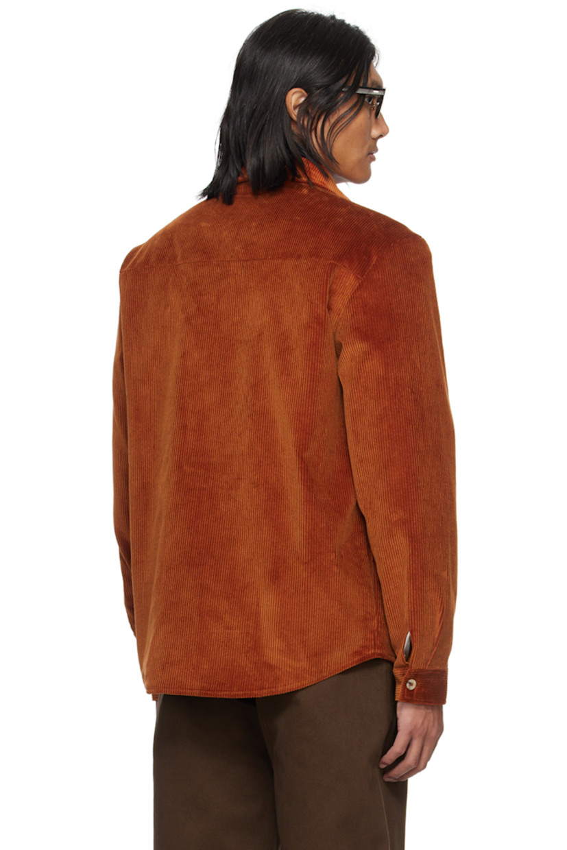 Cotton corduroy shirt.

· Spread collar
· Button closure
· Flap pockets and seam pockets
· Single-button barrel cuffs
· Partial twill and poplin lining
· Horn hardware

Supplier color: Cinnamon