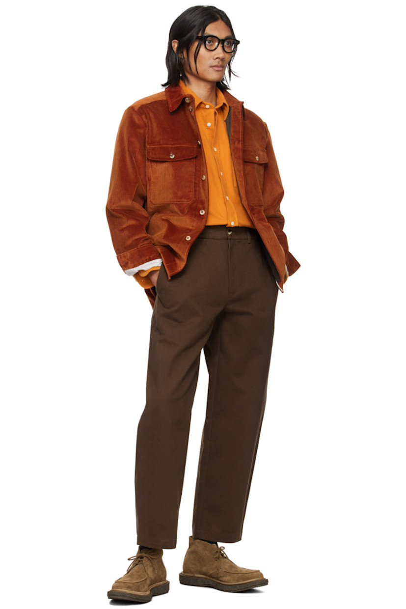 Cotton corduroy shirt.

· Spread collar
· Button closure
· Flap pockets and seam pockets
· Single-button barrel cuffs
· Partial twill and poplin lining
· Horn hardware

Supplier color: Cinnamon