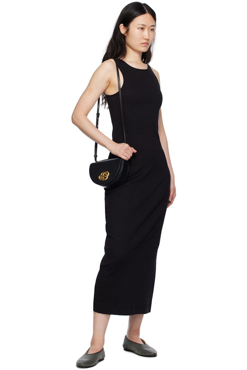 Stretch organic cotton ribbed jersey dress. 

· Scoop neck
· Fixed shoulder straps
· Central seam at back

Supplier color: Black