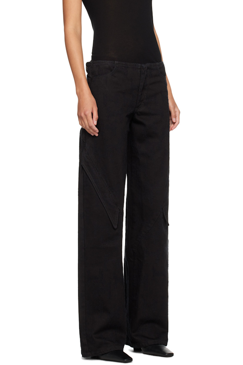 Non-stretch denim jeans. Fil coupé logo pattern throughout.

· Paneled construction
· Four-pocket styling
· Zip-fly
· Flap pockets at front legs
· Adjustable press-stud tabs at back waistband
· Logo-engraved silver-tone hardware

Supplier color: Black
