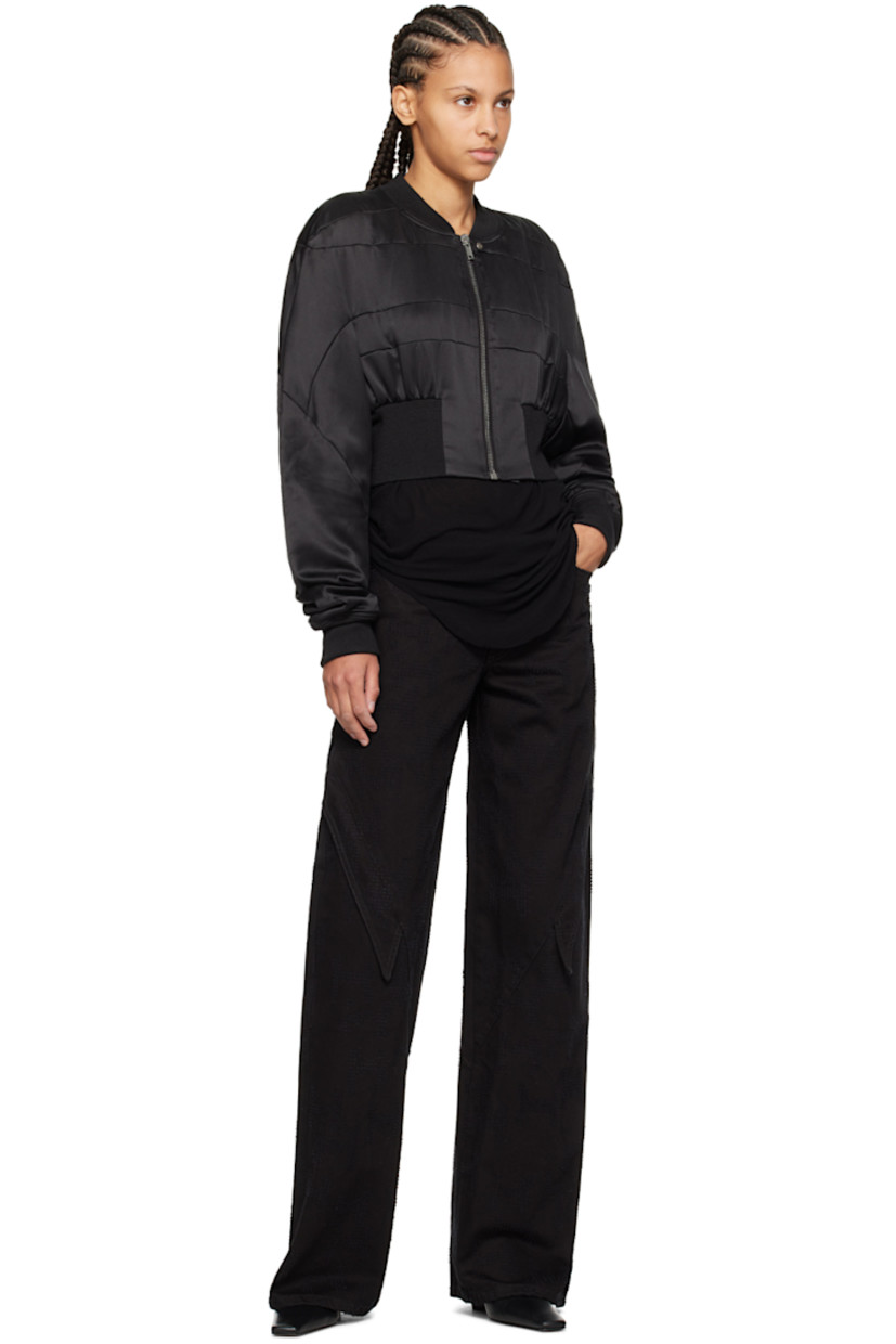 Non-stretch denim jeans. Fil coupé logo pattern throughout.

· Paneled construction
· Four-pocket styling
· Zip-fly
· Flap pockets at front legs
· Adjustable press-stud tabs at back waistband
· Logo-engraved silver-tone hardware

Supplier color: Black