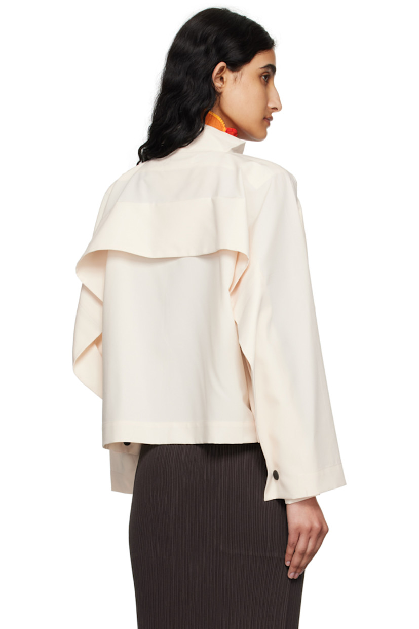 Polyester canvas jacket.

· Press-stud fastening at band collar
· Zip closure
· Foldover panel at chest, back, and back sleeves
· Welt pockets
· Press-stud fastening at hem and cuffs
· Unlined

Supplier color: Ivory