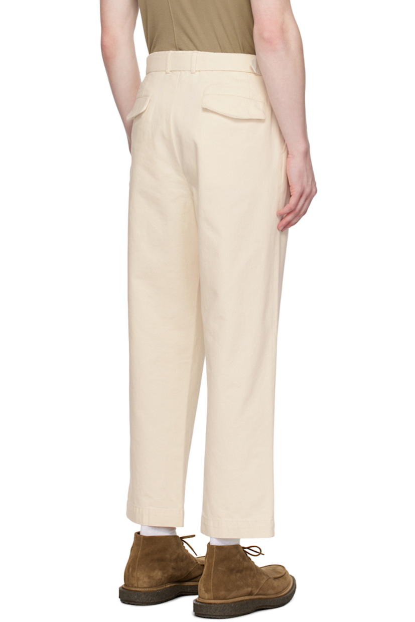 Tapered garment-dyed GOTS-certified organic cotton- and pre-consumer recycled cotton-blend twill trousers. 

· Detachable cinch belt at waistband
· Belt loops
· Four-pocket styling
· Button-fly
· Pleats at front
· Partially lined
· Horn hardware 

Supplier color: Ecru