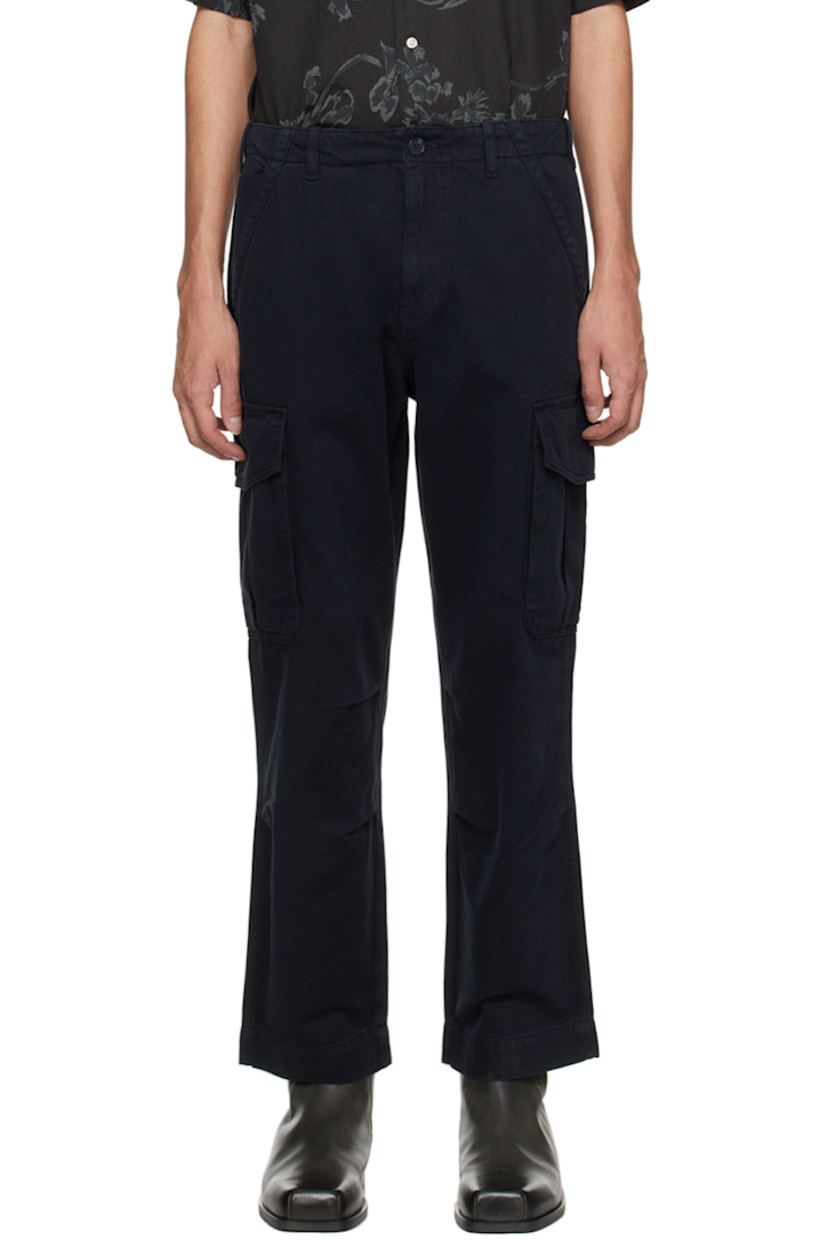 Garment-dyed cotton twill cargo pants.

· Belt loops
· Four-pocket styling
· Zip-fly
· Darts at knees
· Cargo pocket at outseams

Supplier color: Dark navy