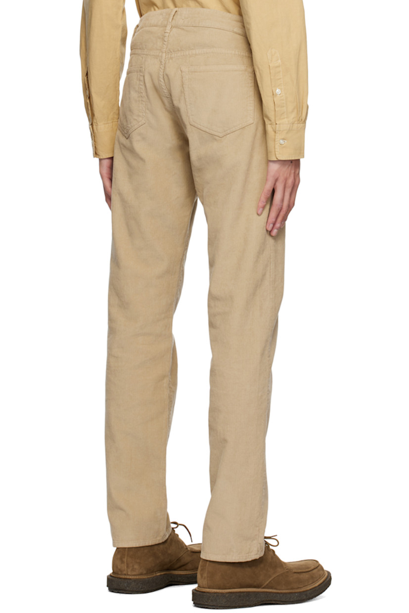 Straight-leg pigment-dyed cotton corduroy trousers. 

· Belt loops
· Five-pocket styling
· Button-fly
· Logo-engraved silver-tone hardware

Supplier color: Almond beige