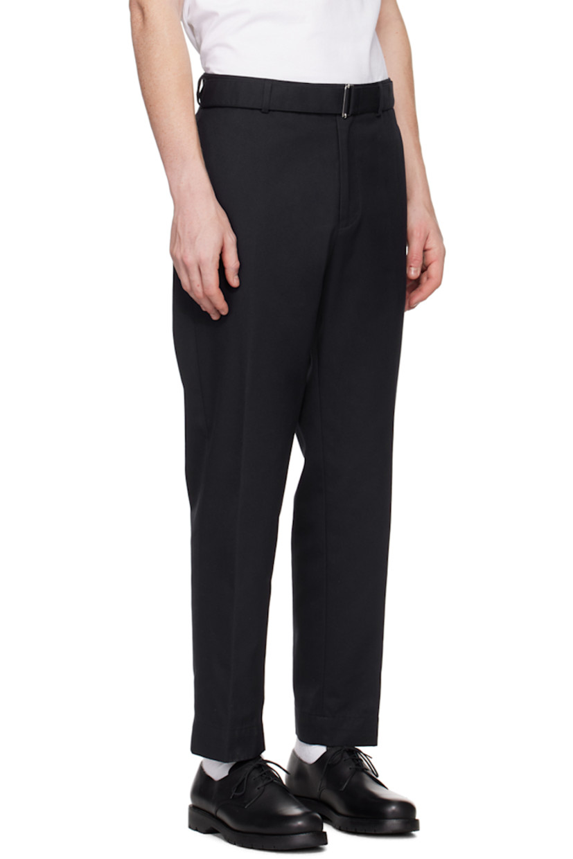 Garment-dyed loose-fit cotton-blend twill trousers.

· Belt loops 
· Detachable cinch belt
· Four-pocket styling
· Zip-fly
· Creased legs

Supplier color: Dark navy