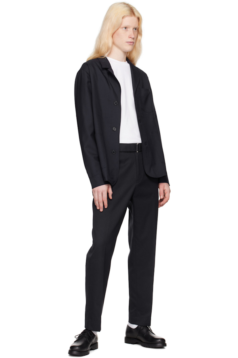 Garment-dyed loose-fit cotton-blend twill trousers.

· Belt loops 
· Detachable cinch belt
· Four-pocket styling
· Zip-fly
· Creased legs

Supplier color: Dark navy