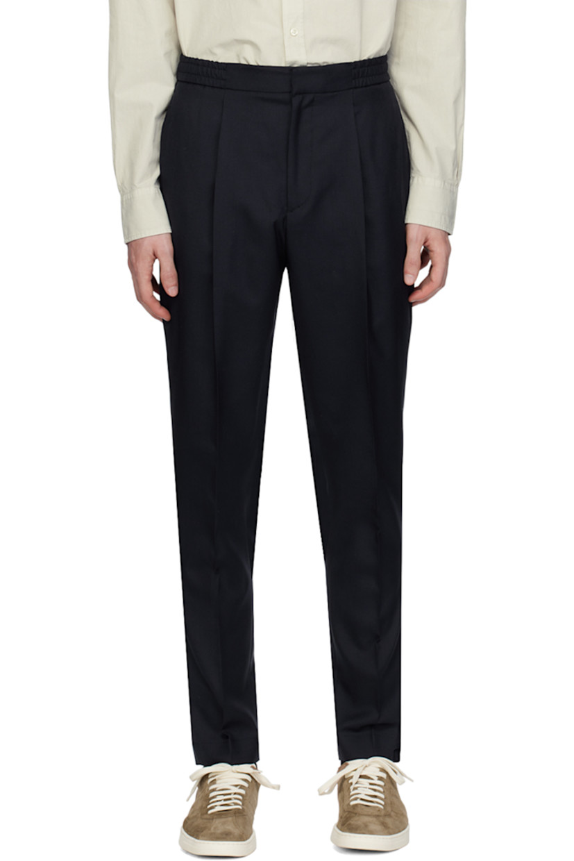 Tapered wool broadcloth trousers. 

· Concealed drawstring at elasticized waistband
· Four-pocket styling
· Zip-fly
· Central crease at legs  

Supplier color: Dark navy