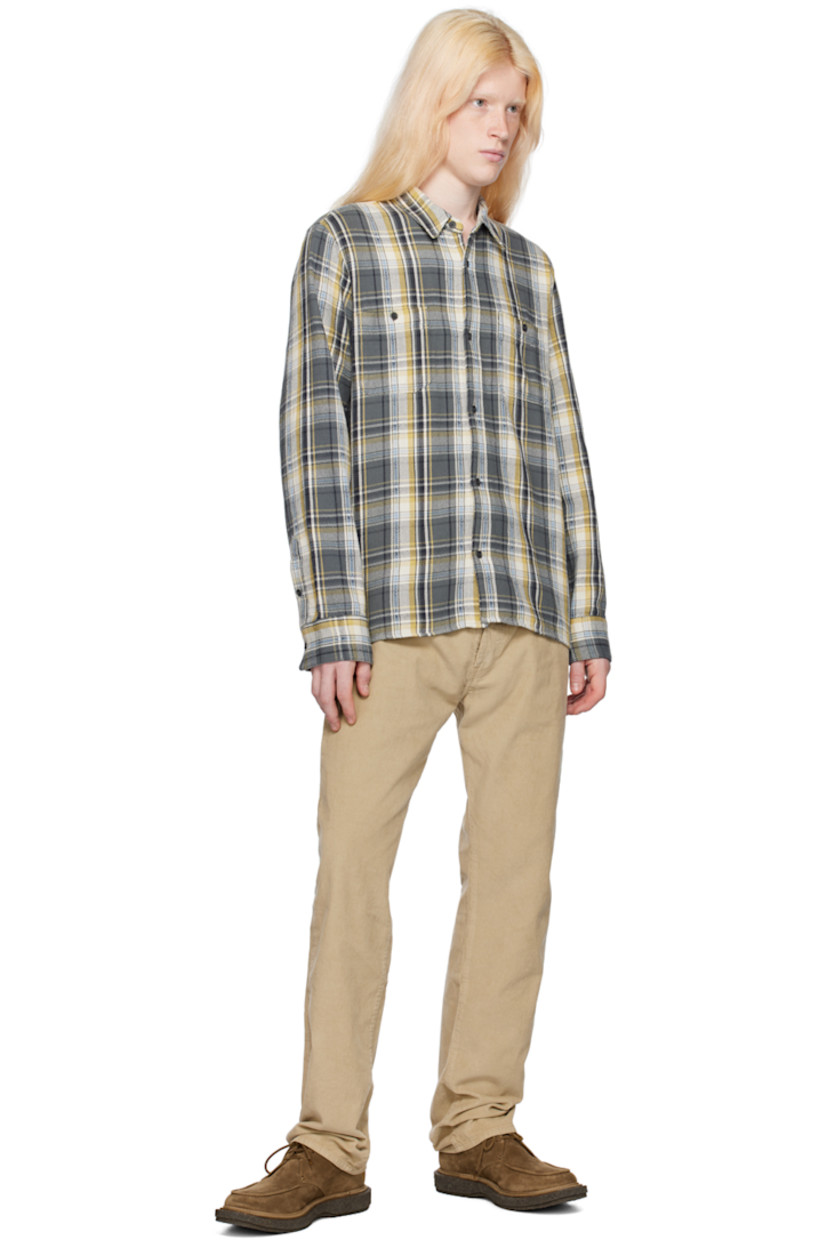 Cotton flannel shirt. Jacquard check pattern throughout.

· Spread collar
· Button closure
· Patch pockets
· Vented side seams
· Single-button barrel cuffs
· Partial plain-woven cotton lining

Supplier color: Olive/Ecru/Mustard