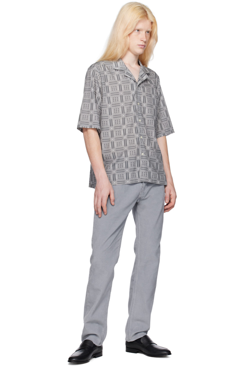 Lyocell- and cotton-blend poplin shirt. Graphic pattern printed throughout.

· Open spread collar
· Button closure
· Vented side seams
· Partial plain-woven cotton lining

Supplier color: Grey/Dk grey/White