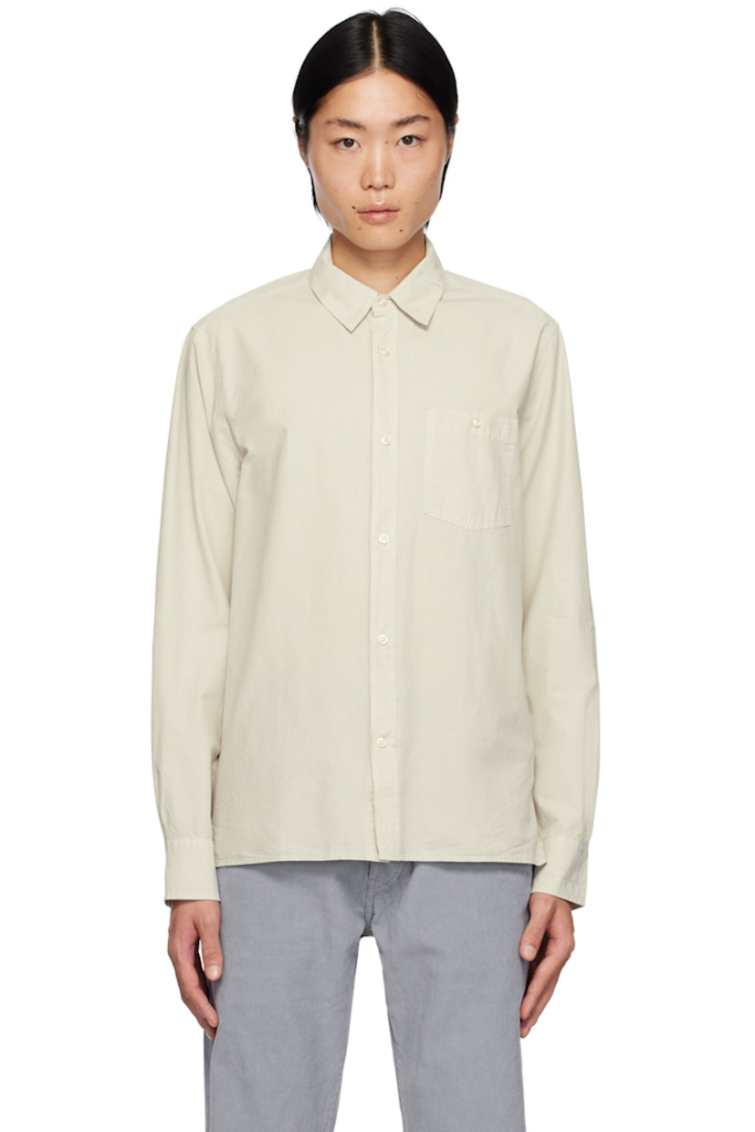 Crinkled garment-dyed lyocell- and cotton-blend poplin shirt. 

· Spread collar
· Button closure
· Patch pocket at chest 
· Tennis-tail hem
· Single-button barrel cuffs

Supplier color: Stone
