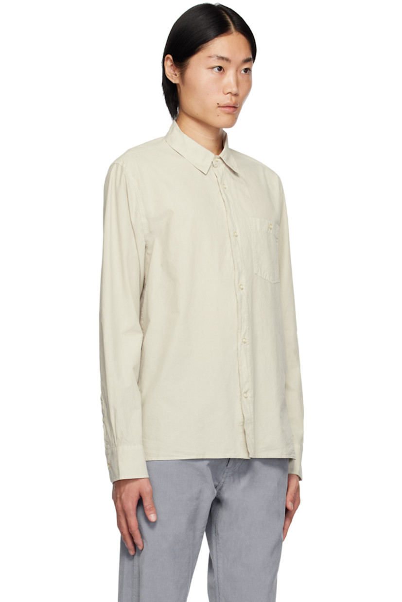 Crinkled garment-dyed lyocell- and cotton-blend poplin shirt. 

· Spread collar
· Button closure
· Patch pocket at chest 
· Tennis-tail hem
· Single-button barrel cuffs

Supplier color: Stone
