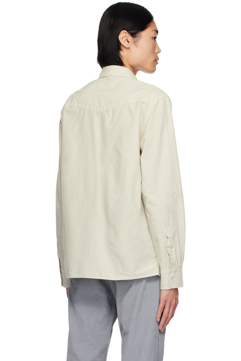 Crinkled garment-dyed lyocell- and cotton-blend poplin shirt. 

· Spread collar
· Button closure
· Patch pocket at chest 
· Tennis-tail hem
· Single-button barrel cuffs

Supplier color: Stone
