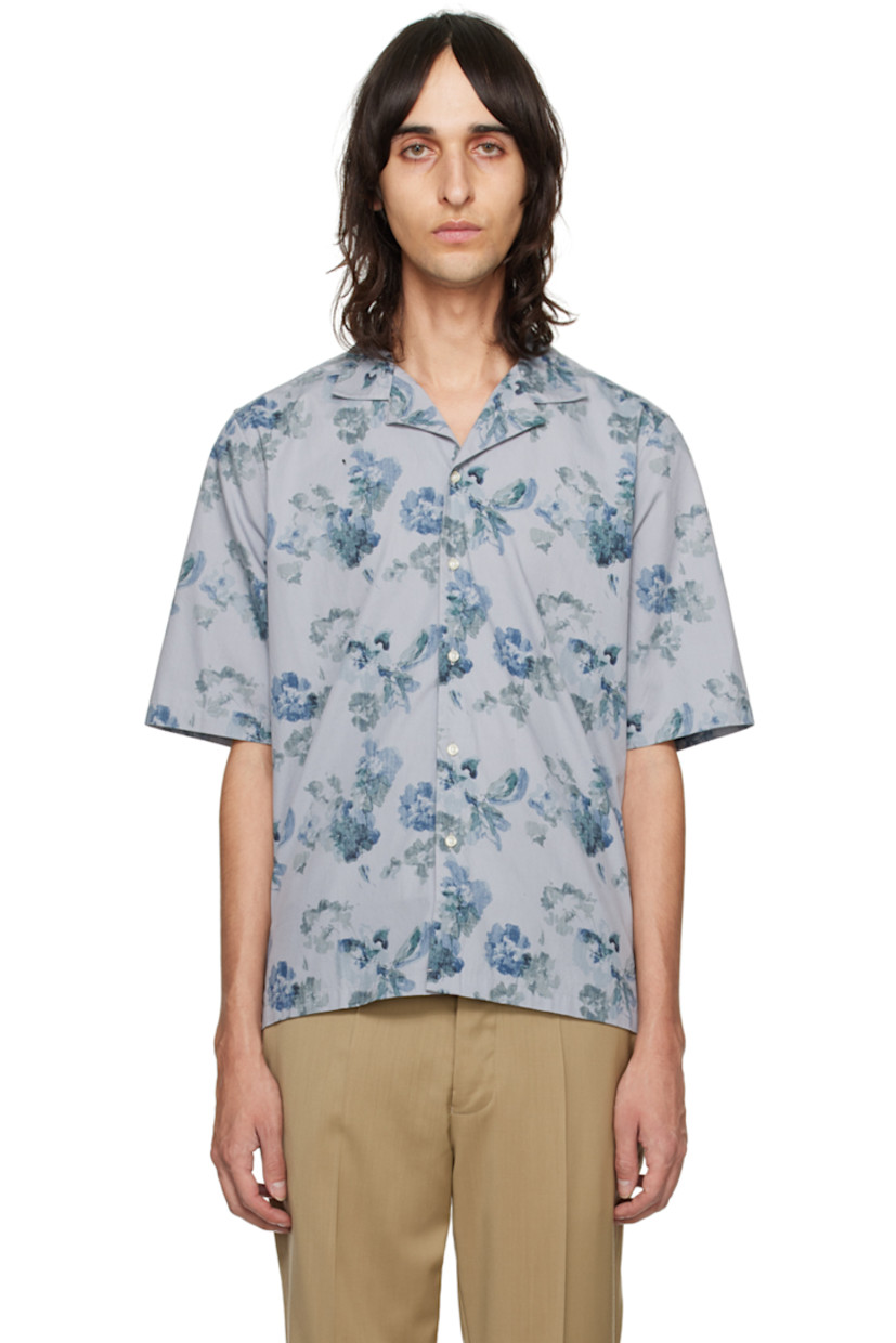 Garment-washed cotton poplin shirt. Floral pattern printed throughout.

· Open spread collar
· Button closure
· Vented side seams

Supplier color: Light blue/Grey