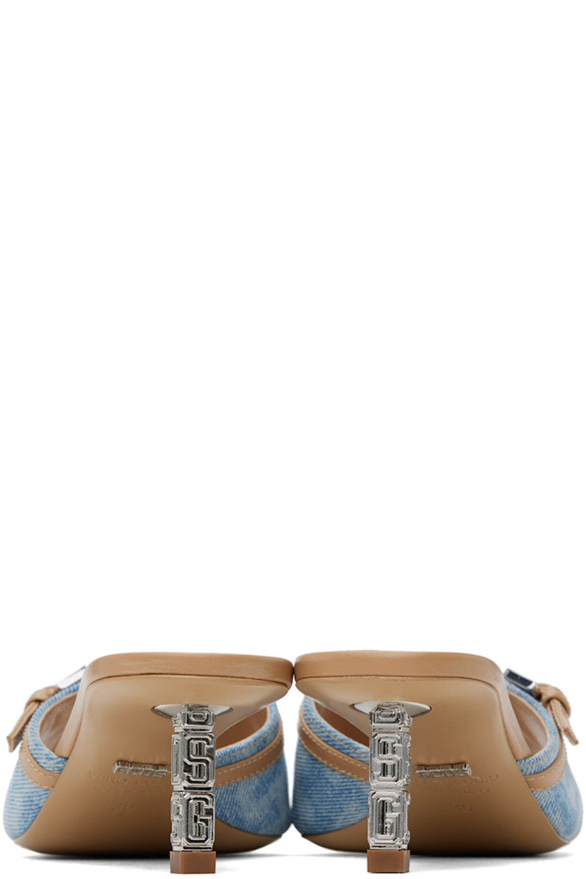 Non-stretch denim slip-on heeled sandals in blue and beige. 

· Buffed calfskin trim and fading throughout
· Open square toe
· Pin-buckle strap at vamp
· Logo embossed at buffed calfskin footbed
· Buffed calfskin lining
· Metal kitten heel with rubber injection
· Logo hardware at heel
· Polished leather sole 
· Logo-engraved silver-tone hardware
· Heel: H1.25"

Supplier color: Light blue