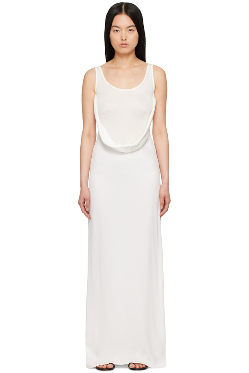 Rib knit stretch viscose crepe dress.

· Paneled construction
· Scoop neck
· Draping at front
· Vent at side seam
· Unlined

Supplier color: White