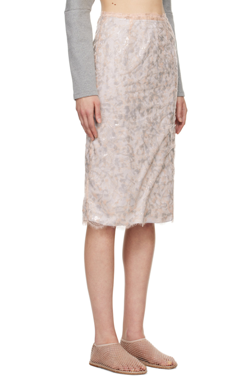 Coated nylon-blend lace skirt.

· Scalloped hem
· Zip closure at back
· Detachable silk satin skirt-style underlay

Supplier color: Chalk