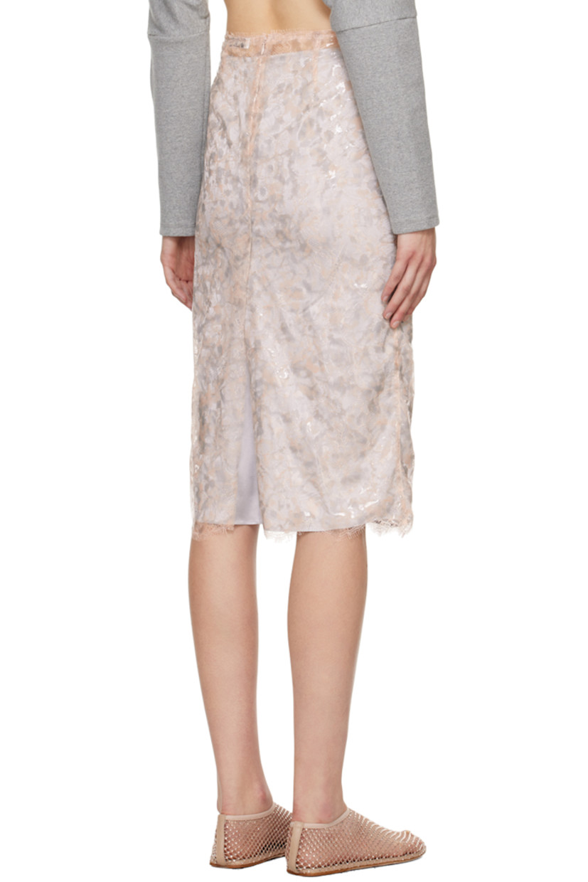 Coated nylon-blend lace skirt.

· Scalloped hem
· Zip closure at back
· Detachable silk satin skirt-style underlay

Supplier color: Chalk