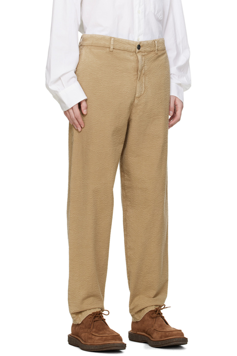 Handcrafted stretch cotton seersucker trousers. Fading throughout. 

· Belt loops
· Four-pocket styling 
· Zip-fly
 
Supplier color: Beige