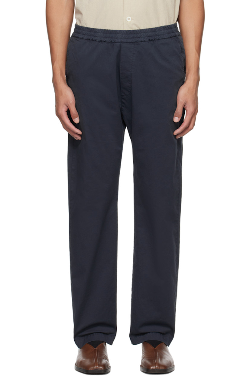 Stretch cotton gabardine trousers.

· Concealed drawstring at elasticized waistband
· Four-pocket styling
· Rolled cuffs

Supplier color: Navy