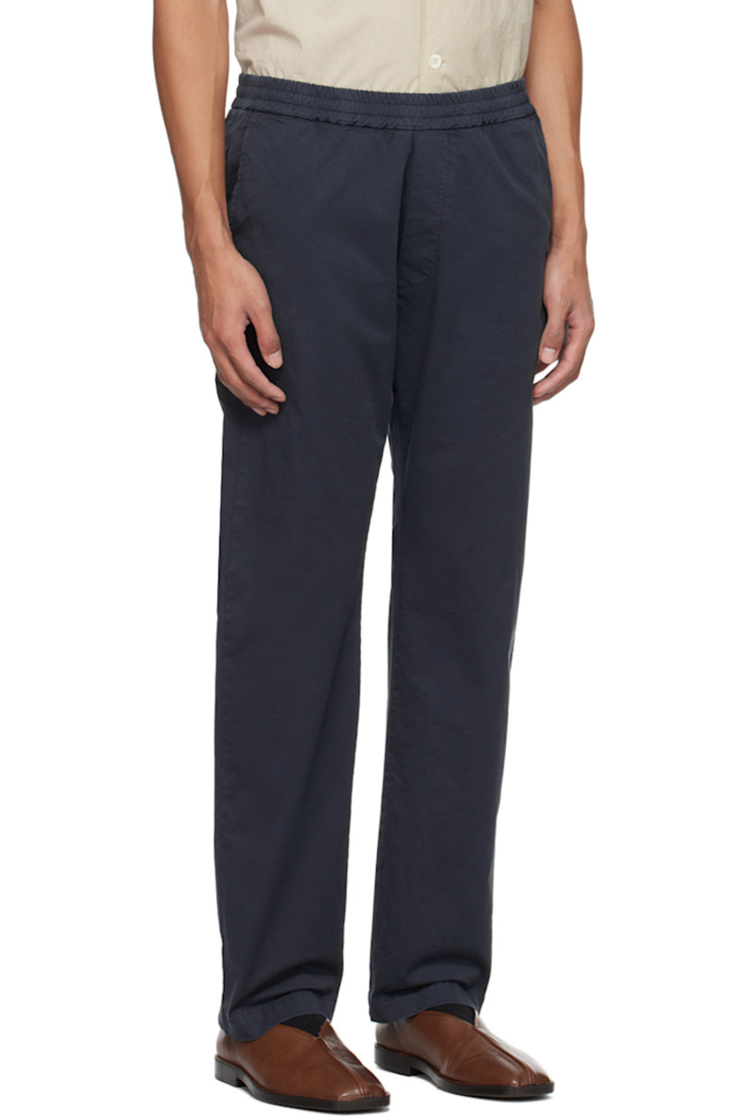 Stretch cotton gabardine trousers.

· Concealed drawstring at elasticized waistband
· Four-pocket styling
· Rolled cuffs

Supplier color: Navy