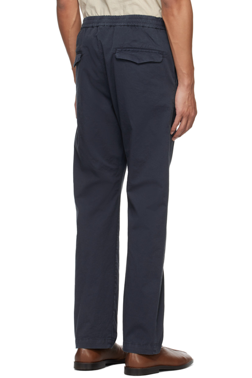 Stretch cotton gabardine trousers.

· Concealed drawstring at elasticized waistband
· Four-pocket styling
· Rolled cuffs

Supplier color: Navy