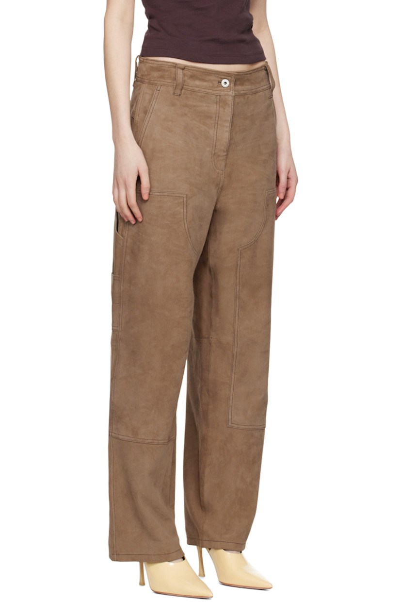 Goatskin suede pants. 

· Paneled construction 
· Belt loops 
· Four-pocket styling 
· Zip-fly
· Patch pocket at outseams 
· Partial stretch satin lining

Supplier color: Sandstone beige