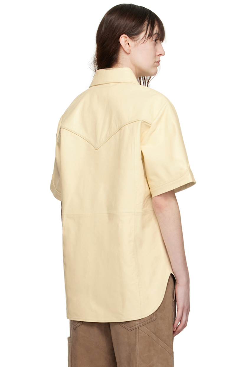 Buffed lambskin shirt. 

· Paneled construction 
· Spread collar 
· Press-stud closure 
· Shirttail hem 
· Rolled cuffs 
· Partial stretch polyester satin lining 

Supplier color: Cream