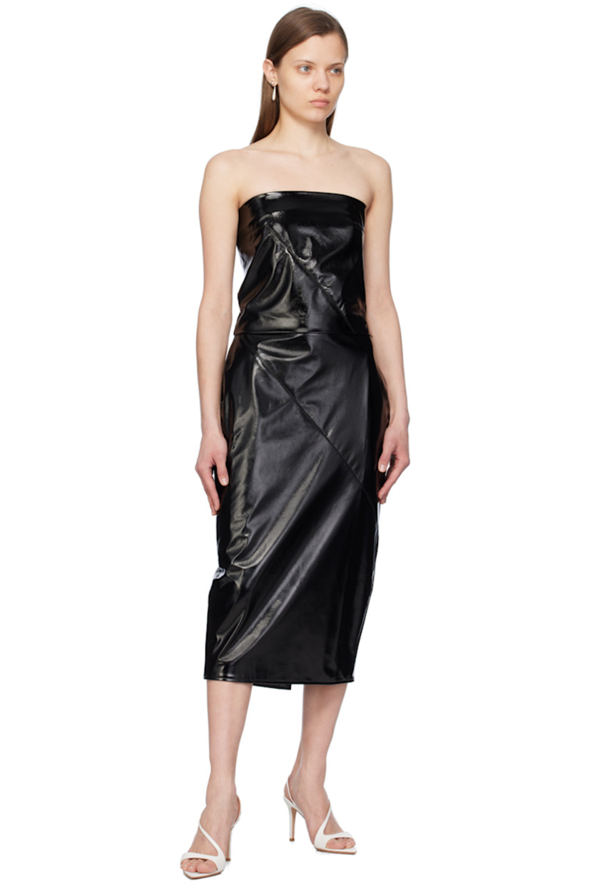 Patent faux-leather skirt.

· Paneled construction
· Concealed zip closure at side seam
· Central vent at back hem
· Full acetate- and cupro-blend satin lining

Supplier color: Black