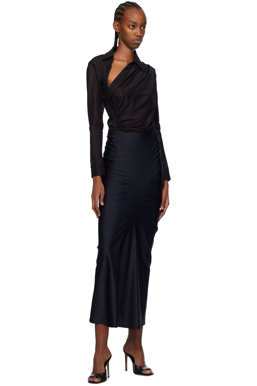 Stretch nylon jersey skirt. 

· Pleats throughout
· Zip closure at back

Supplier color: Black